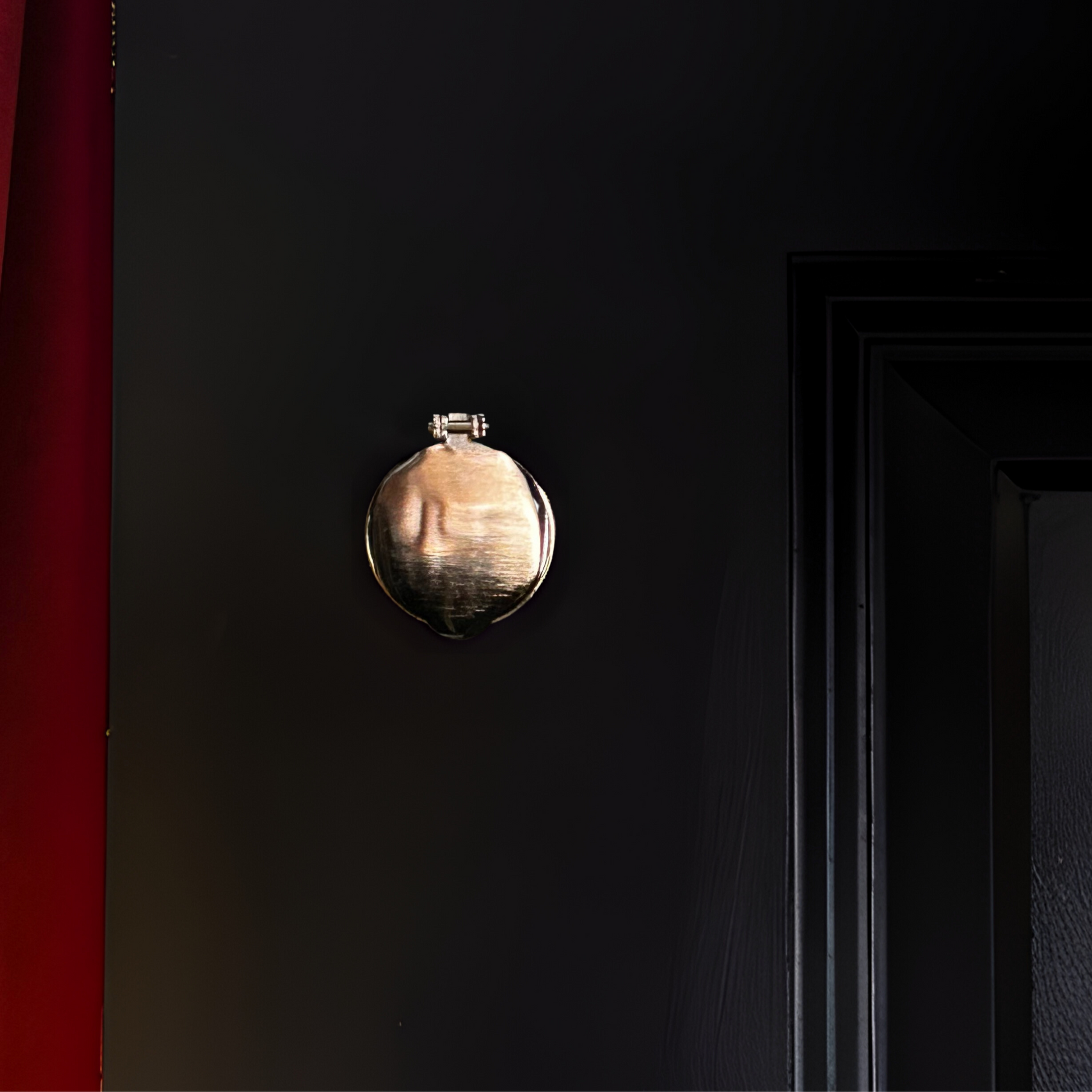 A keyhole cover fitted on a door