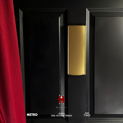 Award winning letterbox draught excluder mounted on a door with company logo Magflap Vertical MK3 in Brass Effect Colour